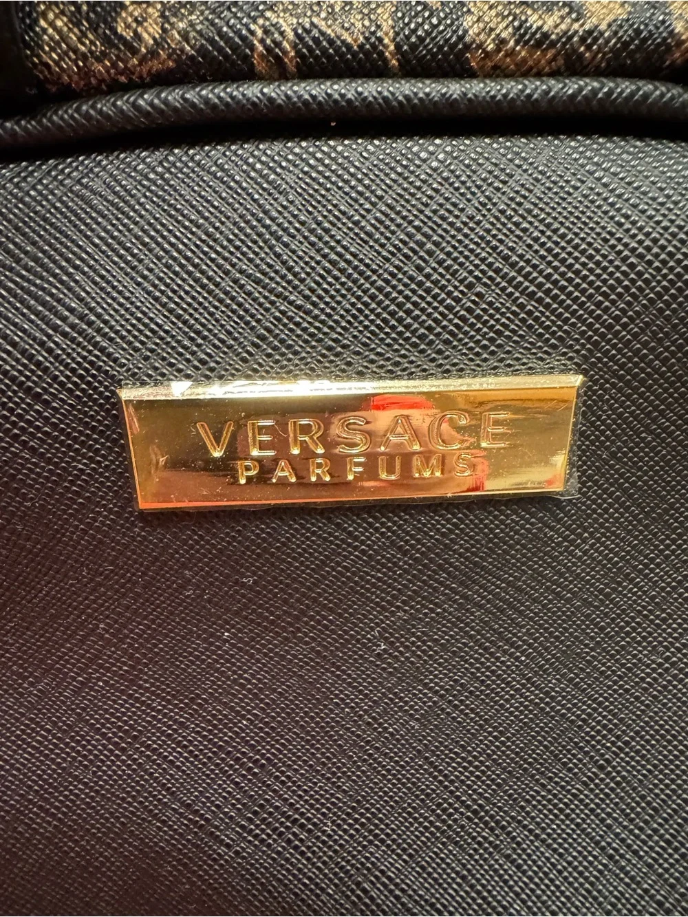 Versace Parfums new never